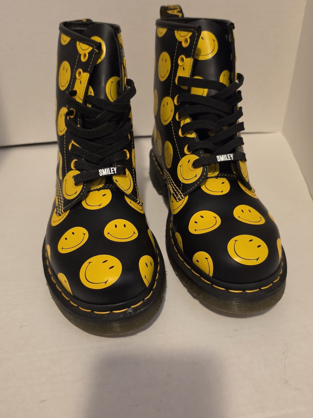 LIKE NEW: Dr. Martens Black Boots with Yellow Smiley Print